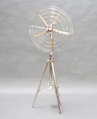 20th Century industrial, an adjustable chrome standard lamp in the form of a 5 bladed fan, raised on a tripod 140cm h x 62cm diam. to the "fan" 