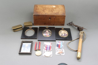 A 19th Century dome topped trinket box containing curios 