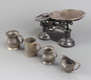 A set of kitchen scales and minor pewter wares
