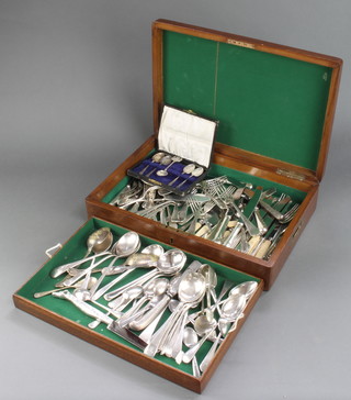 An Edwardian oak canteen with fitted tray and minor plated cutlery 