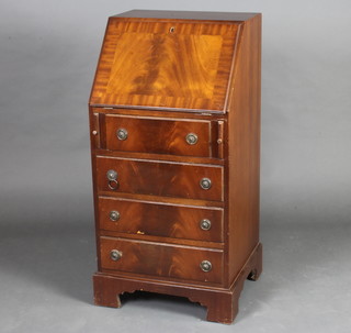 A Georgian style mahogany bureau fitted 4 drawers raised on bracket feet 99cm h x 48cm w x 42cm d 