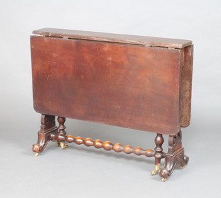 A Victorian mahogany Sutherland table raised on pierced standard end supports 73cm x 91cm x 14cm 