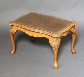 A Queen Anne style shaped figured walnut occasional table with plate glass top, raised on cabriole supports 46cm h x 73cm w x 52cm d 