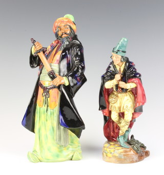 A Royal Doulton figure of The Pied Piper HN2102 24cm and Blue Beard HN2105 27cm 
