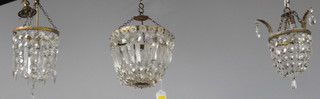 A circular gilt metal bag shaped light shade 19cm x 20cm and 2 similar 20cm x 14cm and 24cm x 16cm 