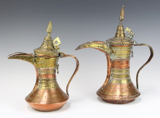 Two copper and brass Turkish coffee pots 33cm h x 16cm and 28cm x 11cm
