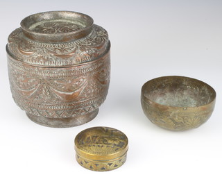 A cylindrical embossed copper tiffin box 17cm x 17cm, an Eastern circular embossed copper bowl decorated figures of lions 5cm x 12cm and a circular embossed brass box decorated a camel 3cm x 8cm  