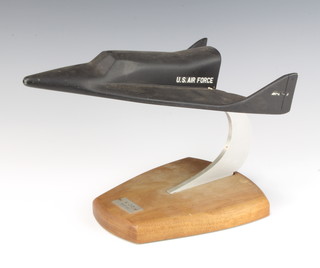 A model of the Boeing X-20 Dyna-Sor space plane raised on a wooden stand 19cm x 30cm x 16cm 