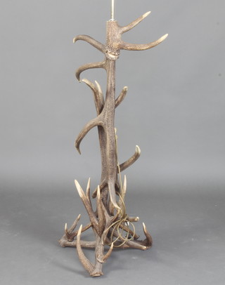 An impressive standard lamp formed from antlers 170cm x 45cm x 50cm  