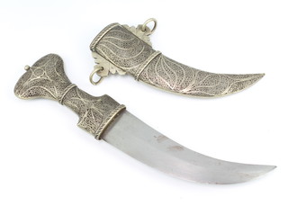 A silver plated cased jambuka with filigree grip and scabbard 36cm 