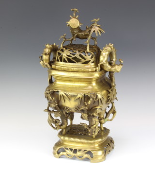 A Japanese gilt bronze koro on stand decorated dragons, the base with seal mark 47cm x 24cm x 24cm 