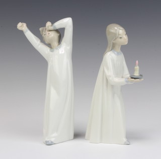 Two Lladro figures of a girl and boy in night dresses 21cm 