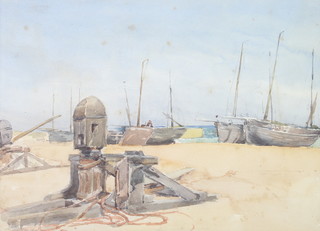 F B Tighe (1885-1926), watercolour, moored fishing boats on a beach 23cm x 32cm 