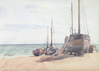 F B Tighe (1885-1926), watercolour unsigned, moored fishing boats on a beach 24cm x 34cm 