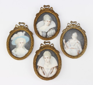 Miniatures, oval watercolours on ivory, studies of four ladies, contained in a cast gilt metal frames 7cm x 5cm 