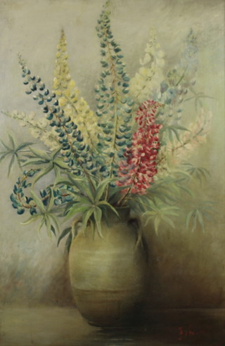 20th Century oil on canvas indistinctly signed, a vase of flowers 74cm x 49cm, 