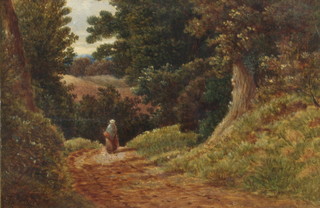 J Prentice, oil on board signed, a lady in a country wooded lane 18cm x 28cm 