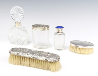 A silver mounted toilet jar Birmingham 1914, 2 mounted  brushes a scent bottle and toilet bottle