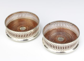 A pair of contemporary sterling silver pierced coasters 12.5cm 