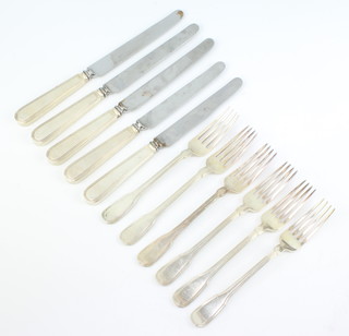 A set of 6 Tiffany sterling silver dinner forks 460 grams together with 5 silver handled knives 