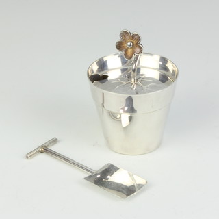 A Tiffany sterling silver flower pot with lid and a ditto miniature spade, 80 grams