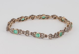An 18ct yellow gold emerald and diamond Edwardian style bracelet, the diamonds approx. 1.45ct, emeralds approx. 2.5ct 17.5cm 