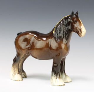 A Beswick figure of a standing shire horse no.818, brown gloss by Arthur Gredington 21.6cm 