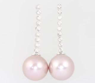 A pair of 18ct white gold 9 stone diamond and pink cultured pearl earrings 35mm, the pearls 11mm 