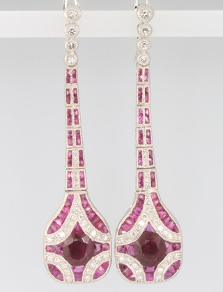 A pair of platinum Art Deco style ruby and diamond articulated drop earrings, the rubies approx. 4.5ct, brilliant cut diamonds 0.95ct, 58mm 