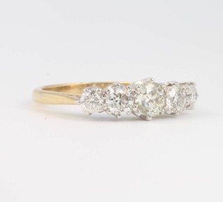 An 18ct yellow gold 5 stone diamond ring, approx. 1.5ct, size P 1/2