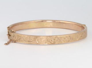 A 9ct yellow gold chased hollow bangle 7.5 grams 