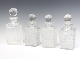 A set of 3 cut glass square spirit decanters and stoppers 23cm, a single ditto 26cm 