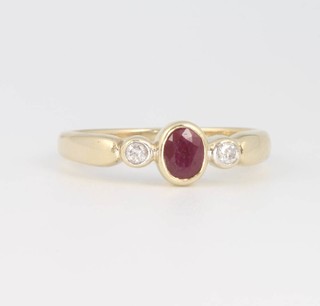 A 9ct yellow gold ruby and diamond ring size N 