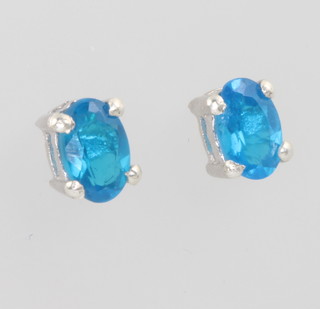 A pair of silver apatite ear studs