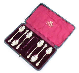 A set of 6 Edwardian cased silver teaspoons and nips, London 1909, 46.9 grams 