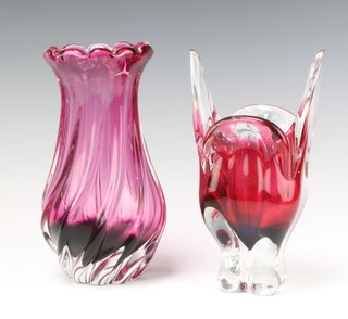 A Studio Glass cranberry coloured spiral vase 23cm, a ditto 22cm 