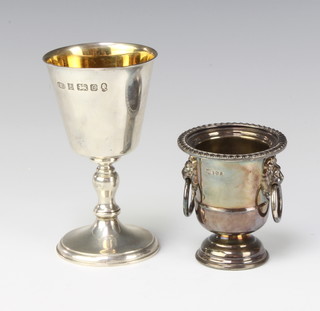 A silver goblet with gilt bowl Birmingham 1977 12cm and a silver cocktail stick holder, 246 grams 