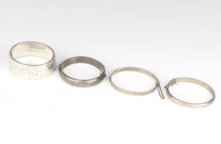 Four silver bangles, 97 grams 