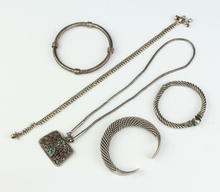 A silver bangle and minor silver jewellery, 149 grams