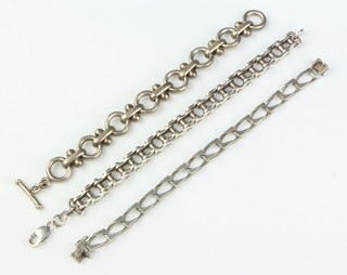 A silver bike chain bracelet and 2 other bracelets 141 grams