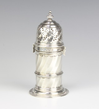 A Britannia silver sugar shaker of spiral form with bayonet cover, 1892, 149 grams, 13.5cm 