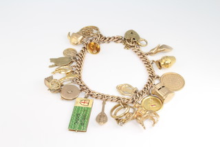 A 9ct yellow gold charm bracelet 41.4 grams