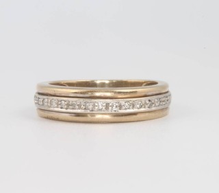A 9ct yellow gold diamond set half eternity ring 3.4 grams, size M 