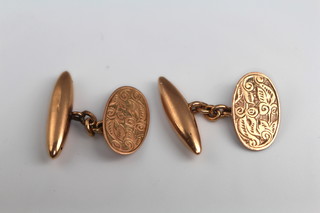 A pair of 9ct yellow gold engraved cufflinks 6.7 grams 