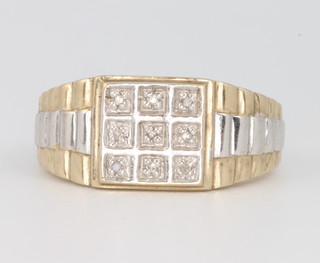 A 9ct yellow gold diamond set signet ring 5.6 grams, size V 