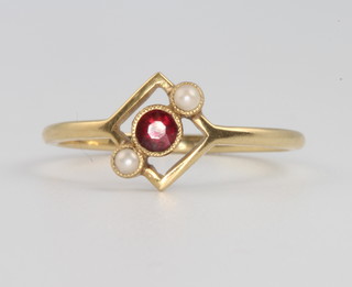 An 18ct yellow gold ruby and pearl ring, size K, 1.5 grams