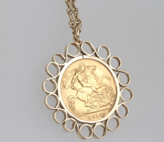A half sovereign 1913, contained in a 9ct yellow gold mount and chain, 11 grams