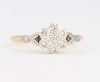 An 18ct yellow gold diamond cluster ring 2.7 grams, size Q 1/2