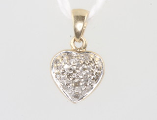 A 14ct yellow gold diamond set heart pendant, 1 gram