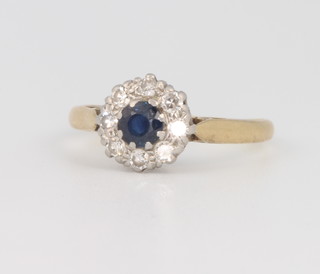 An 18ct yellow gold circular sapphire and diamond cluster ring size K, 2.5 grams 